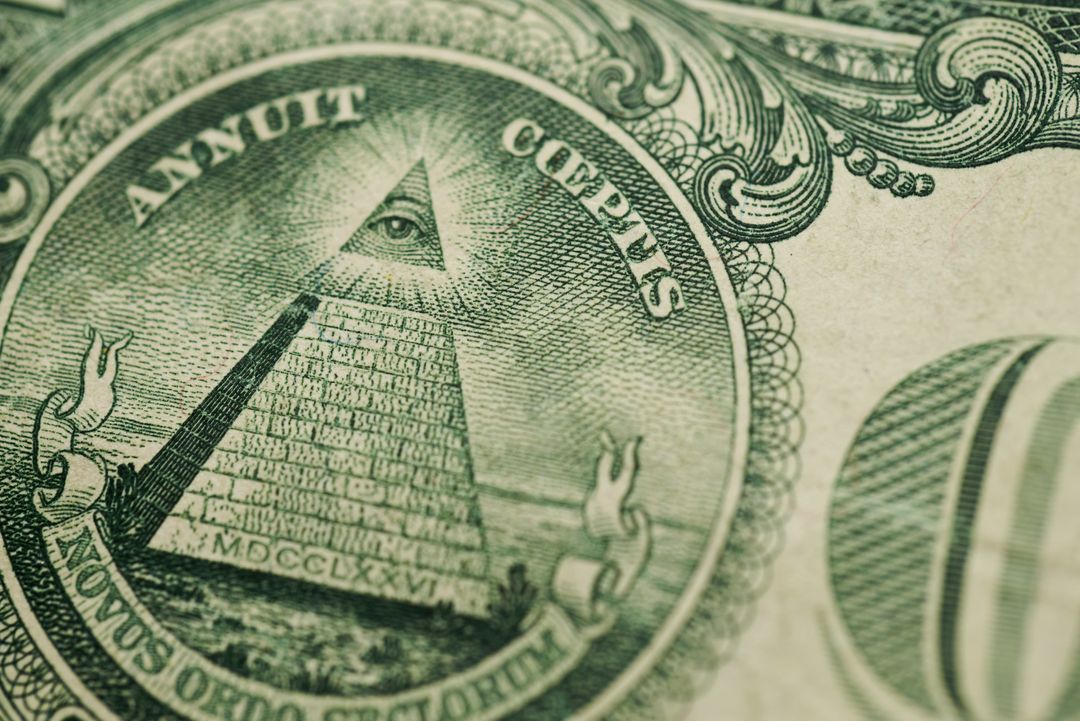 Close-Up of Eye within Pyramid on Dollar Bill