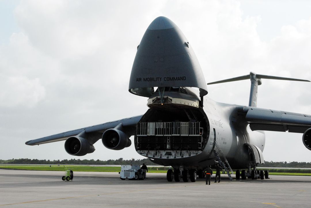 U.S. Air Force C-5 Offloading Express Logistics Carrier 4 at Kennedy Space Center - Free Images, Stock Photos and Pictures on Pikwizard.com