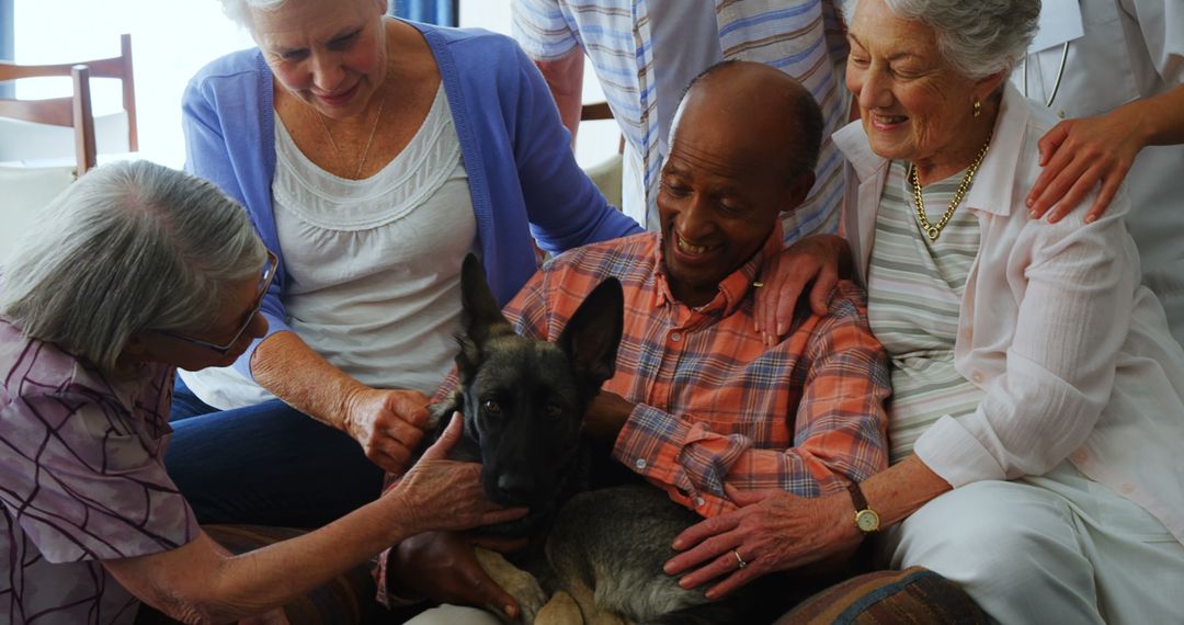 Group of Seniors Enjoying Companionship With Friendly German Shepherd Puppy
