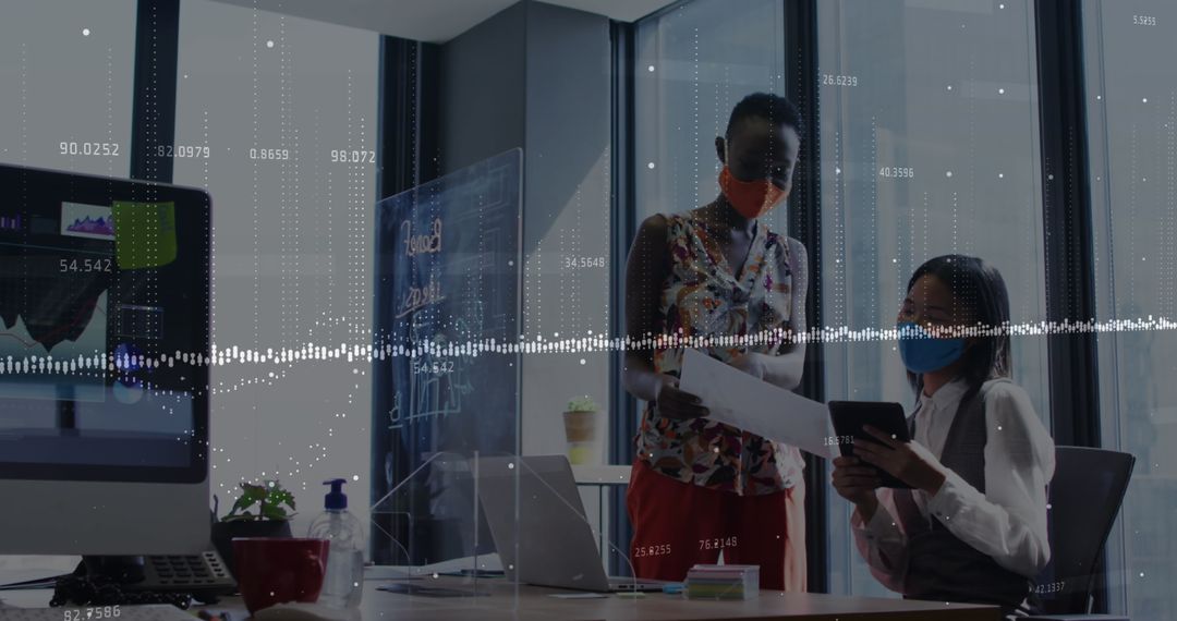 Diverse Business Team Analyzing Financial Data During Pandemic