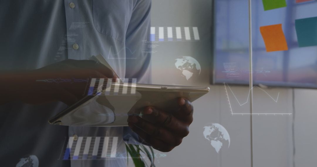 Professional Analyzing Business Data on Digital Tablet in Modern Office