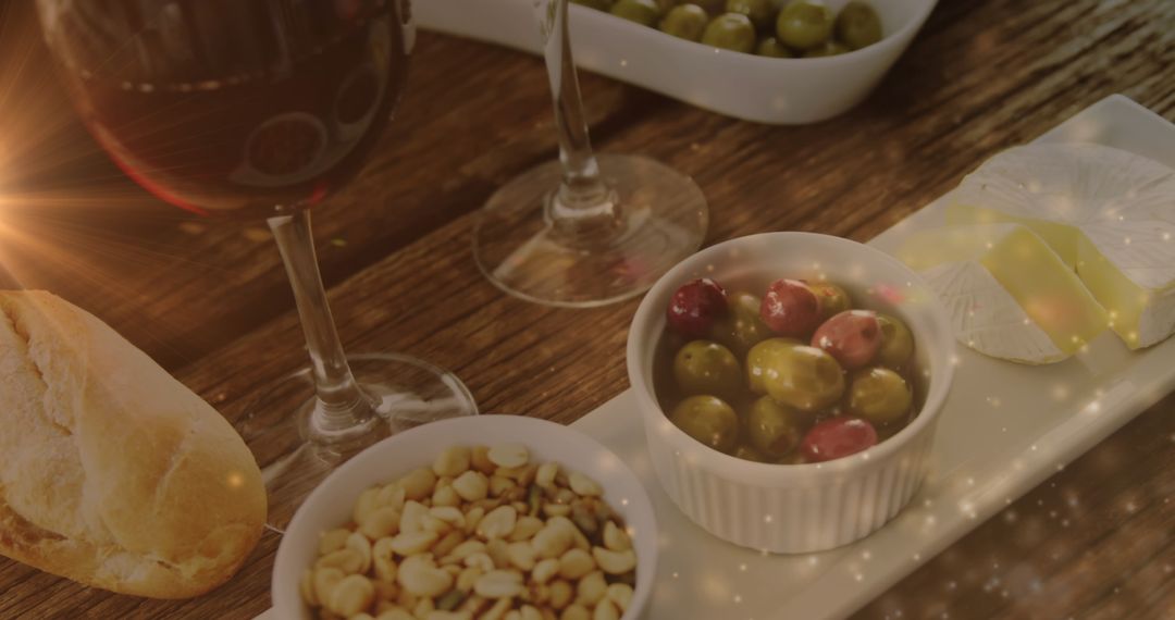 Elegant Wine and Snacks on Rustic Wooden Table with Lights