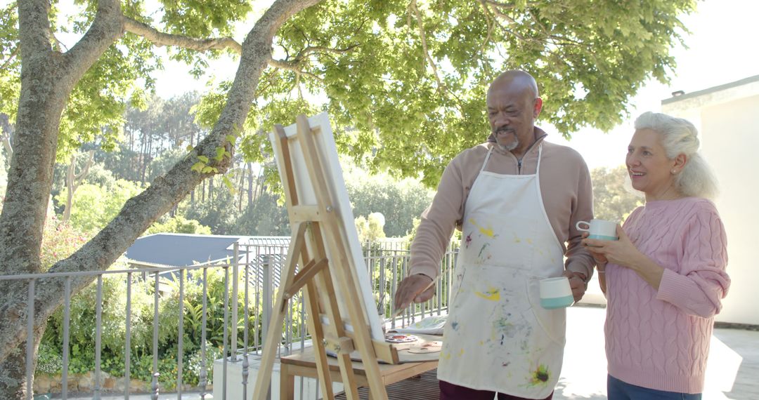 Senior Couple Enjoying Outdoor Painting Session - Free Images, Stock Photos and Pictures on Pikwizard.com