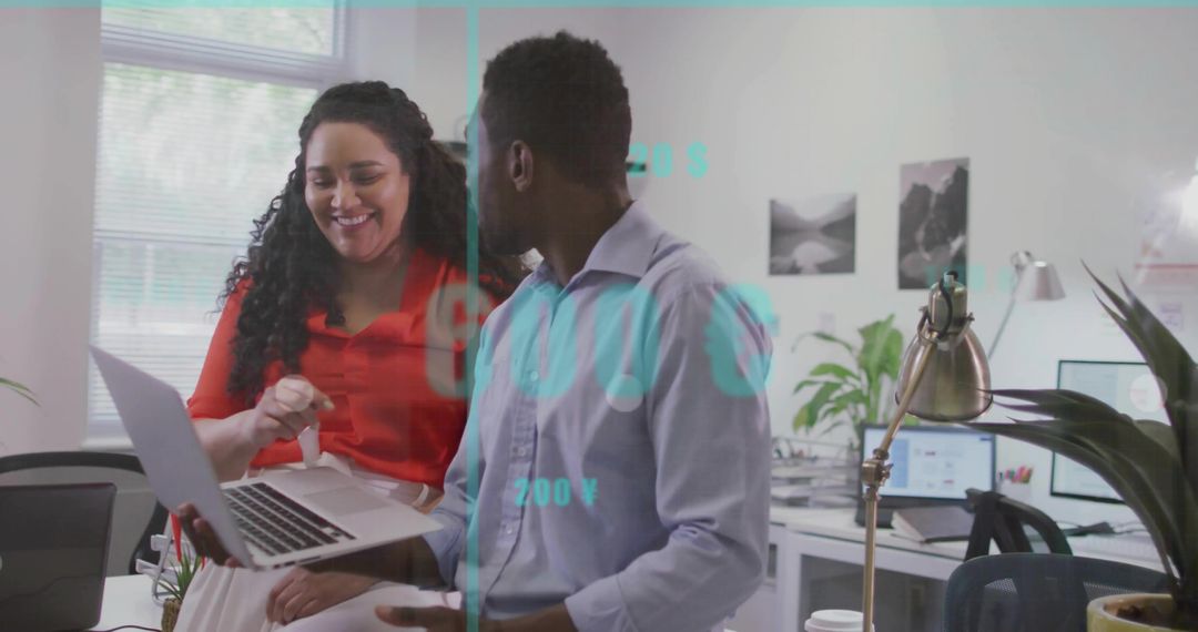 Colleagues Collaborating in Modern Open-Plan Office with Technology