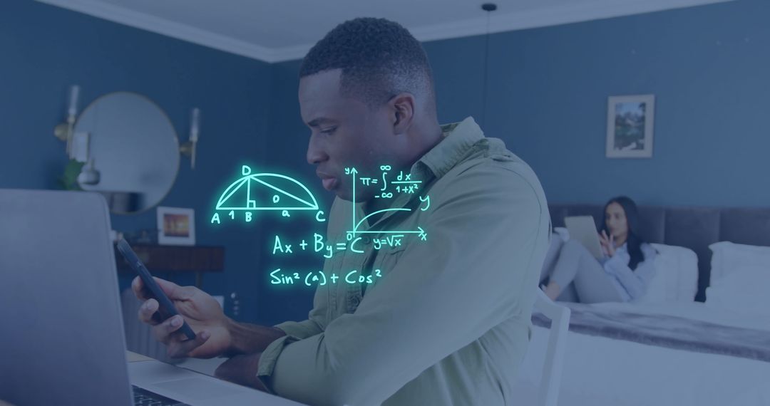 Man Using Laptop and Phone with Math Equations Overlaid