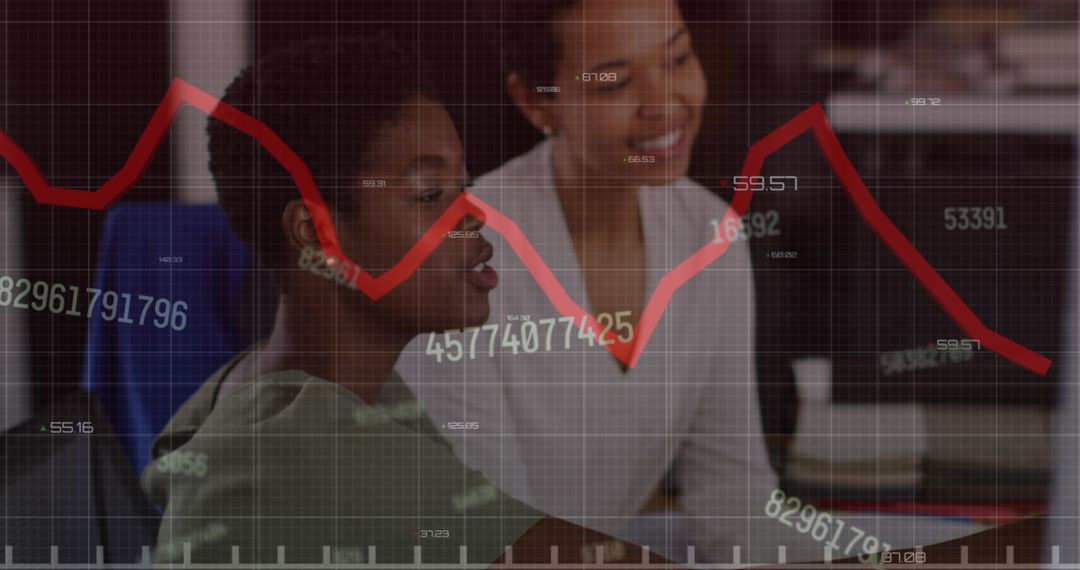 Diverse Businesswomen Analyzing Data with Graph Overlay