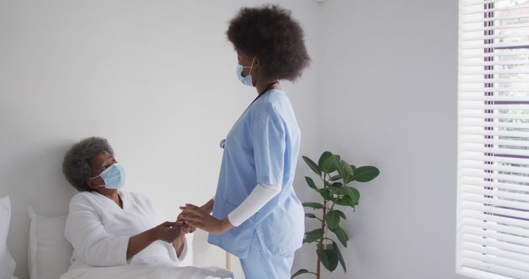 Nurse Comforting Elderly Patient in Hospital - Free Images, Stock Photos and Pictures on Pikwizard.com