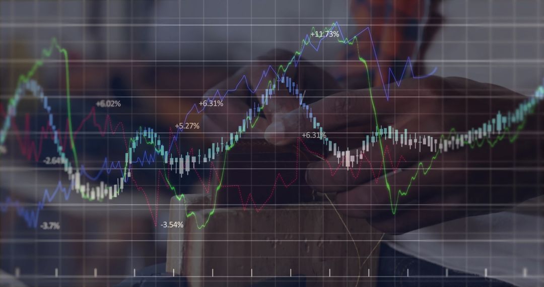 Man Analyzing Financial Charts on Smartphone at Wooden Desk