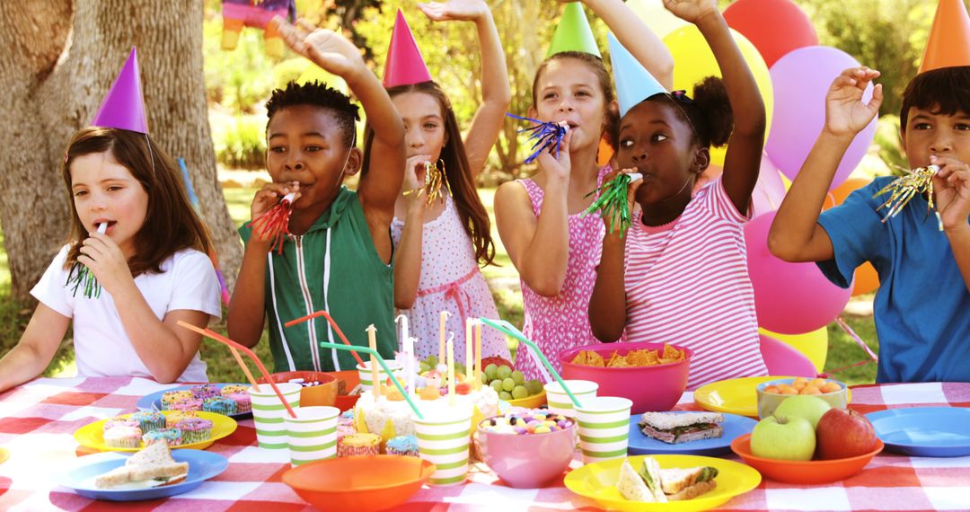 Diverse Children Celebrating Birthday Party Outdoors - Free Images, Stock Photos and Pictures on Pikwizard.com