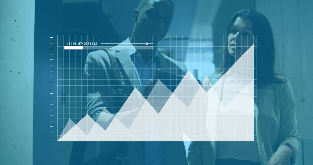 Diverse Colleagues Analyzing Digital Financial Data in Office