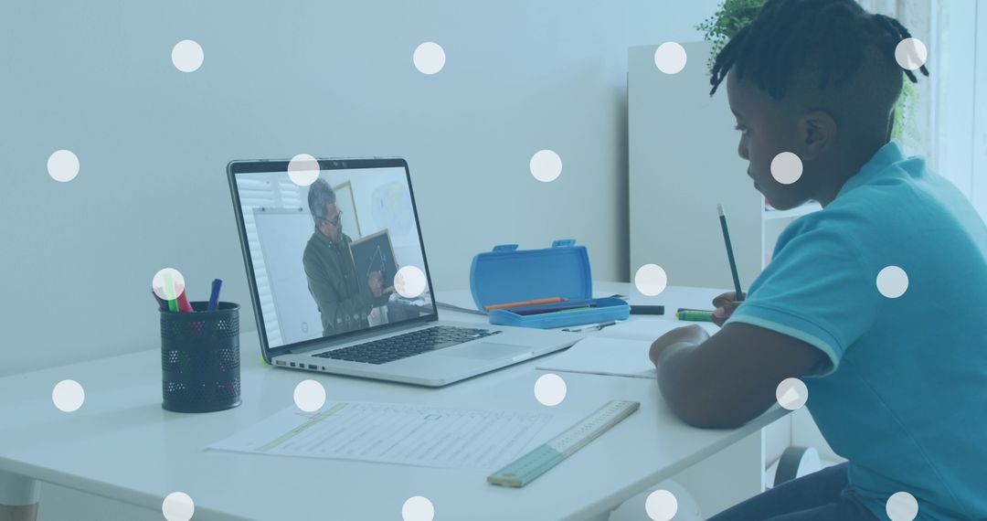 Child Engaging in Online Learning at Home Desk
