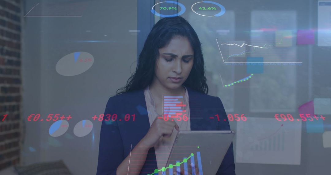 Businesswoman Analyzing Financial Data with Tablet in Modern Office