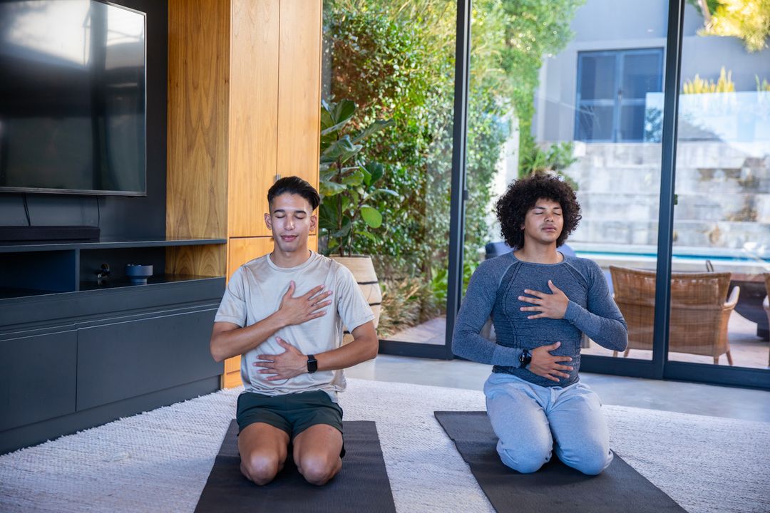 Diverse Friends Practicing Meditation at Home for Relaxation