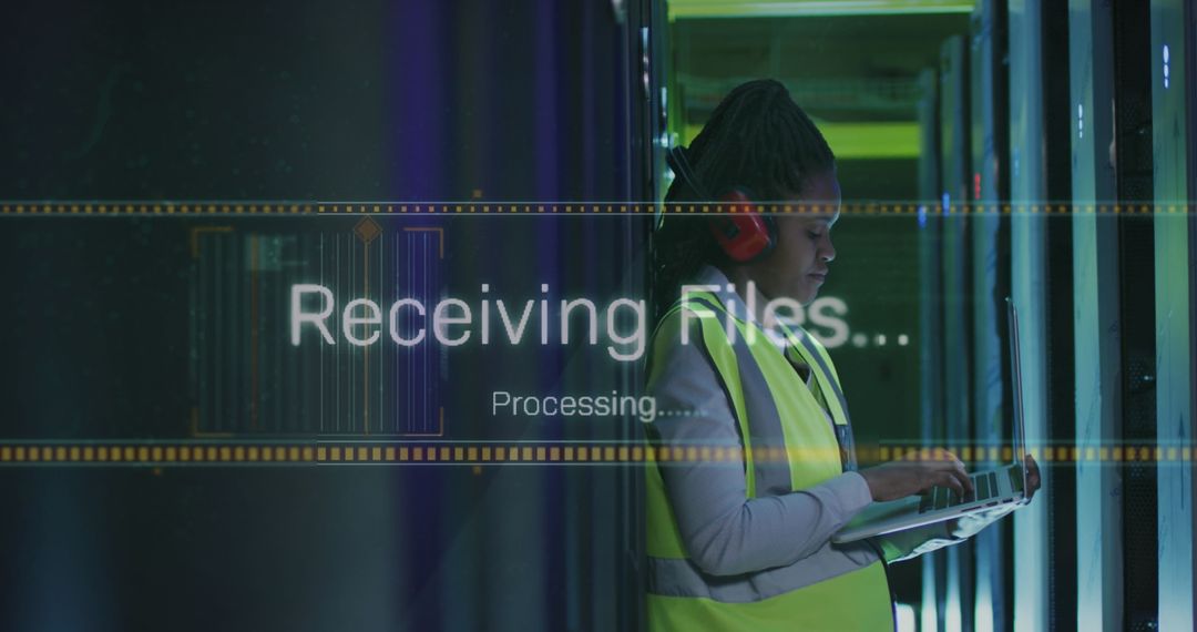 IT Engineer Managing Data Transfer in Server Room