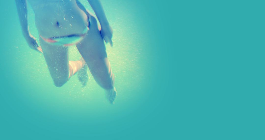 Person Swimming Underwater in Clear Blue Sea - Free Images, Stock Photos and Pictures on Pikwizard.com