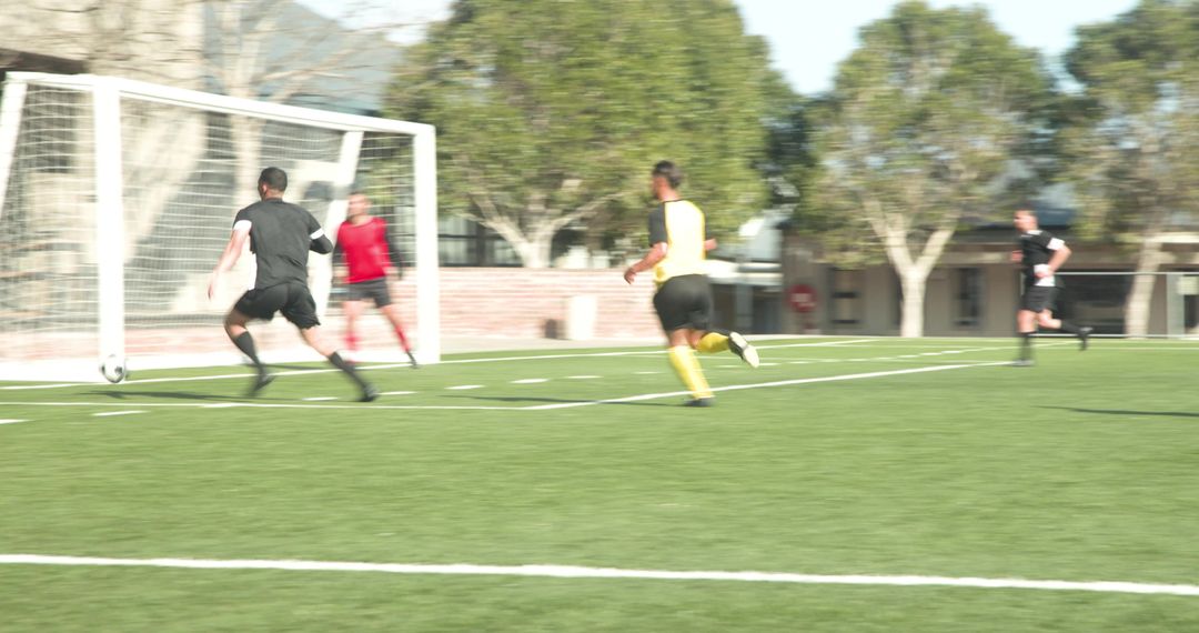Soccer Match Action on School Field with Players Competing Vigorously