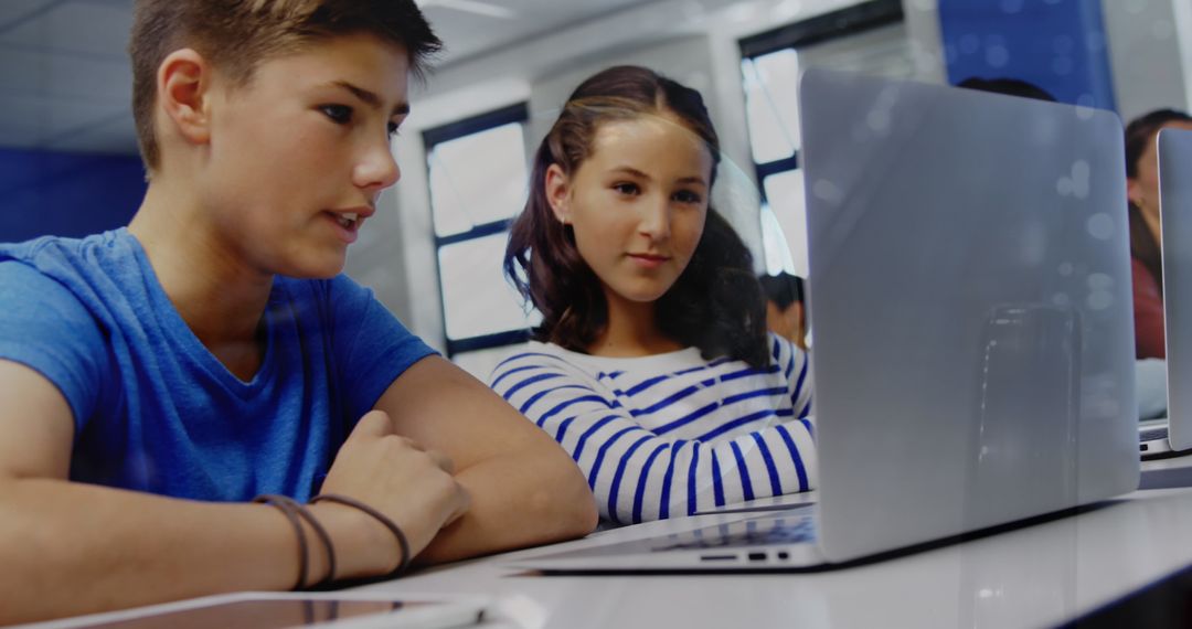 Diverse Schoolchildren Using Laptops for Global Learning