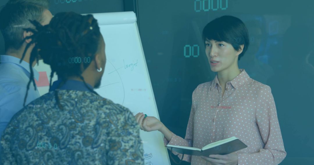 Team Members Discussing Digital Data in Business Meeting