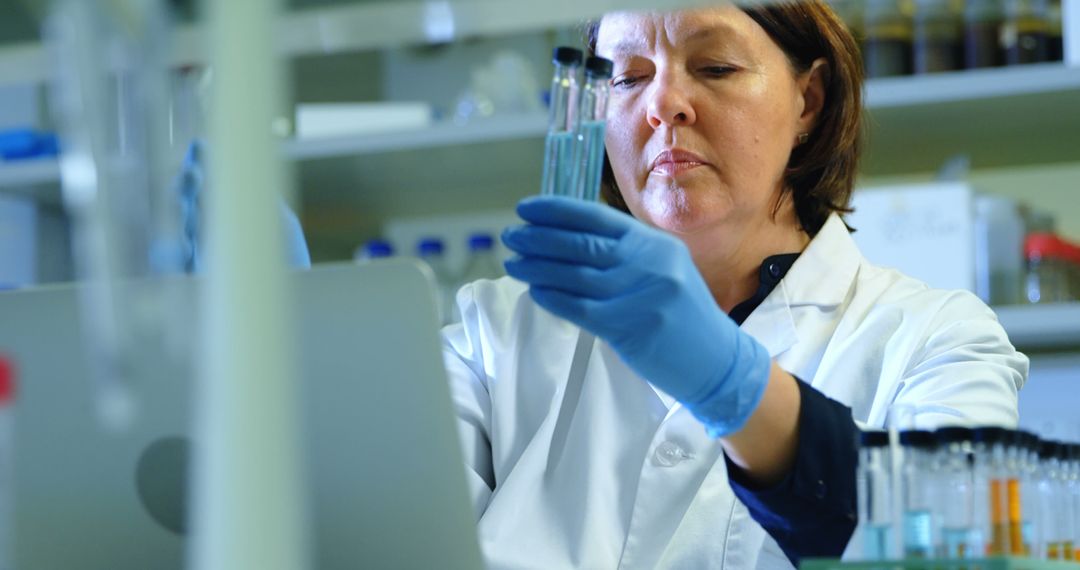 Female Scientist Analyzing Samples in Laboratory - Free Images, Stock Photos and Pictures on Pikwizard.com