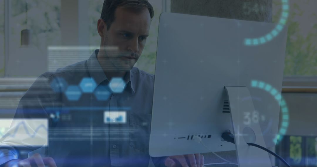 Business Professional Analyzing Data on Desktop with Futuristic Display