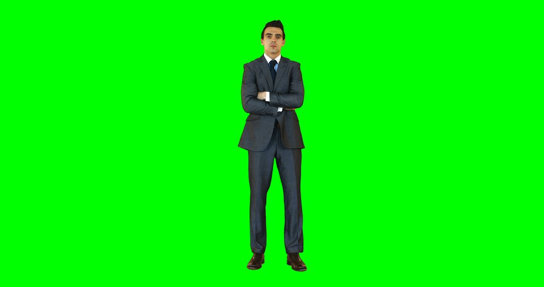 Confident Businessman Standing With Arms Crossed on Green Screen Background - Free Images, Stock Photos and Pictures on Pikwizard.com