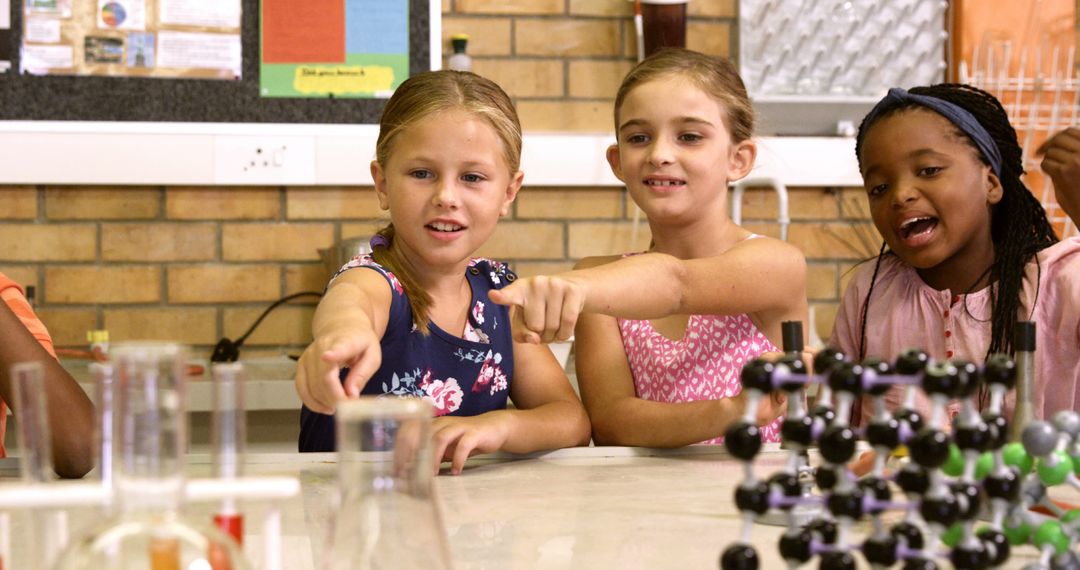 Diverse Group of Schoolchildren Engaging in Science Experiment in Classroom - Free Images, Stock Photos and Pictures on Pikwizard.com