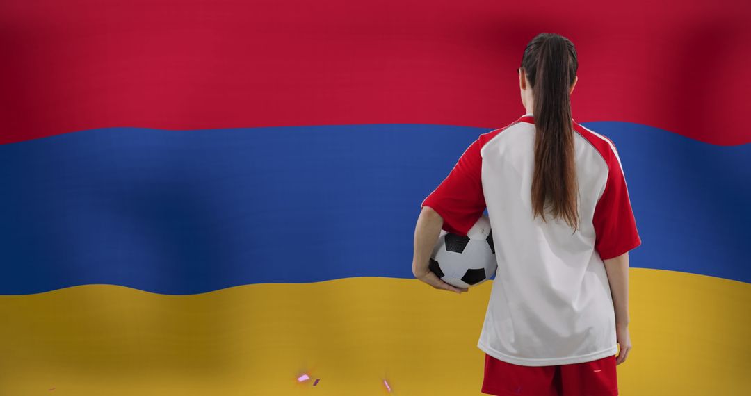 Caucasian Female Soccer Player Holding Ball Proudly with Armenian Flag Backdrop - Free Images, Stock Photos and Pictures on Pikwizard.com