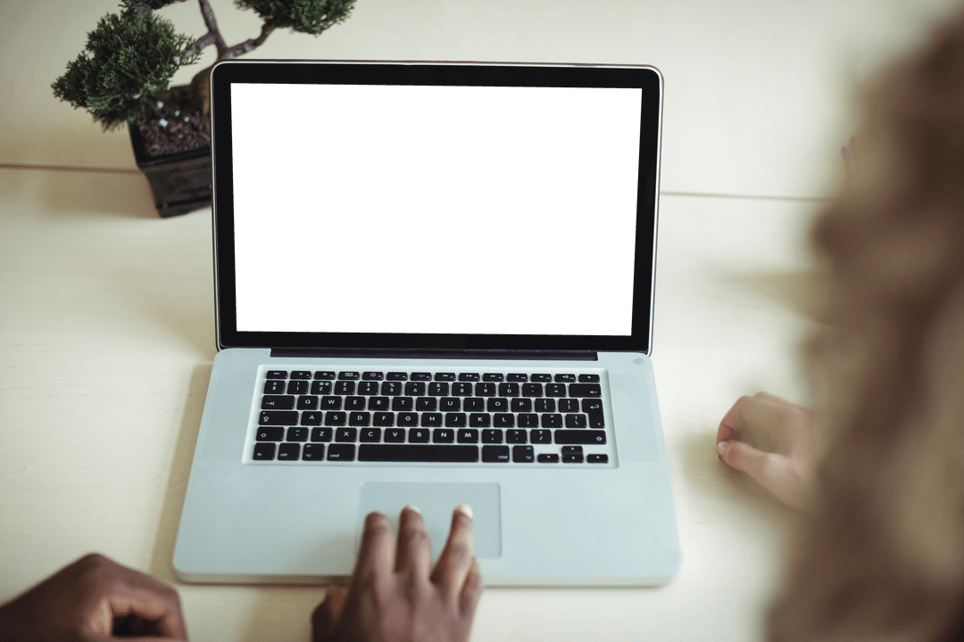Business Professionals Collaborating at Transparent Laptop Display