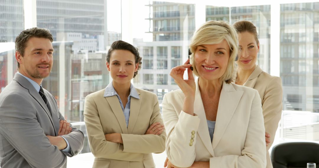 Confident Business Team Smiling in Modern Office Environment
