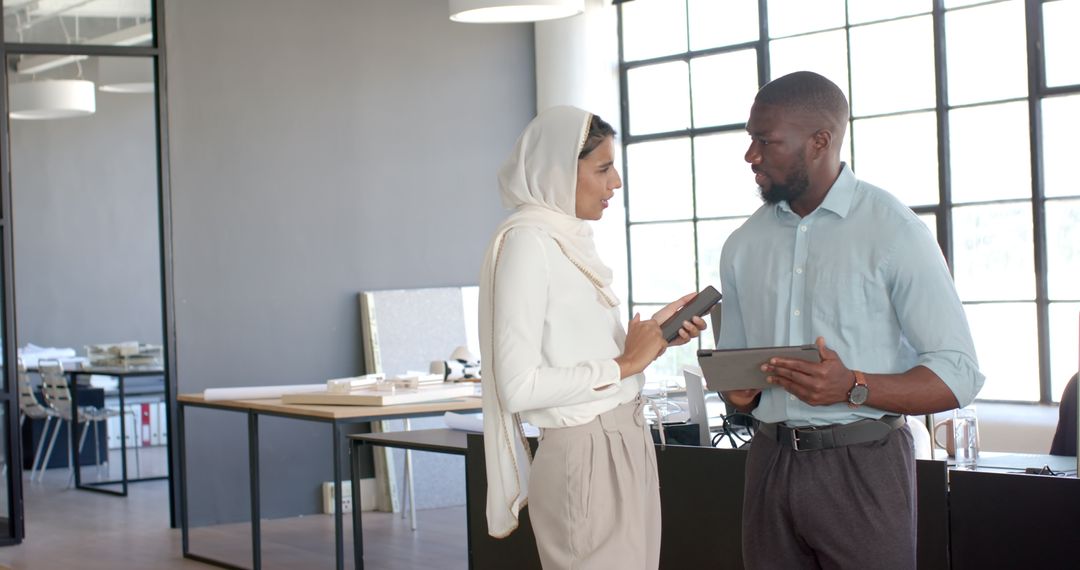 Business Professionals Utilizing Technology in Workplace