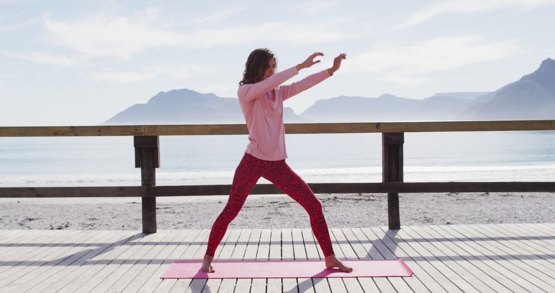 Woman Practicing Yoga on Beachfront Deck - Free Images, Stock Photos and Pictures on Pikwizard.com