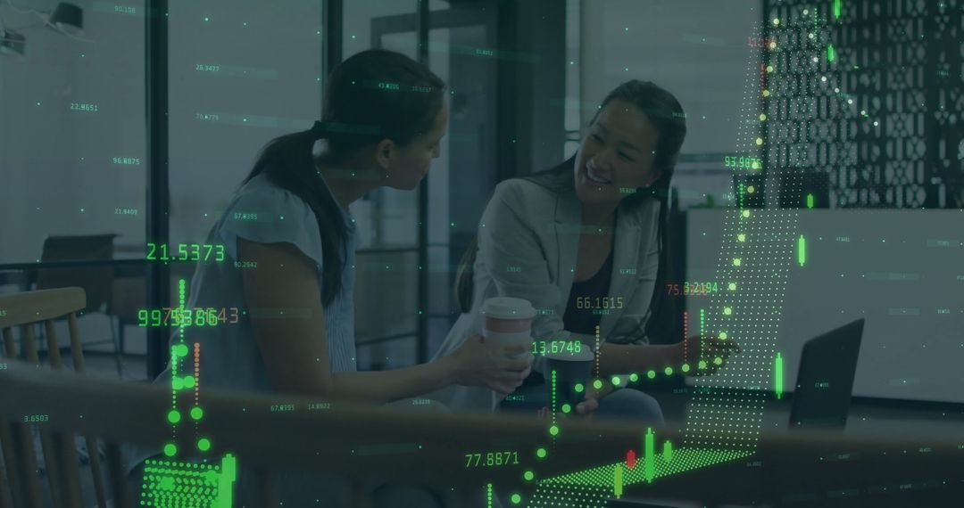 Colleagues Discuss Overlapping Financial Graphs in Modern Office