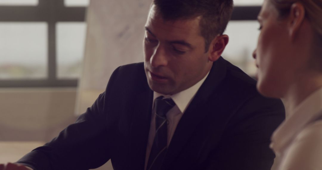 Professional Business Discussion Between Colleagues