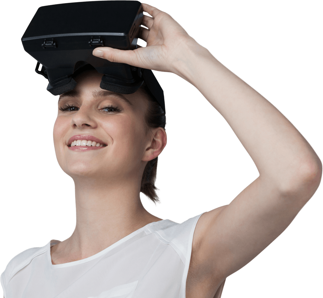 Young Woman Smiling While Removing Transparent Virtual Reality Headset