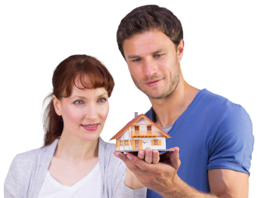 Smiling Couple Holding Transparent Model House for Real Estate - Download Free Stock Images Pikwizard.com