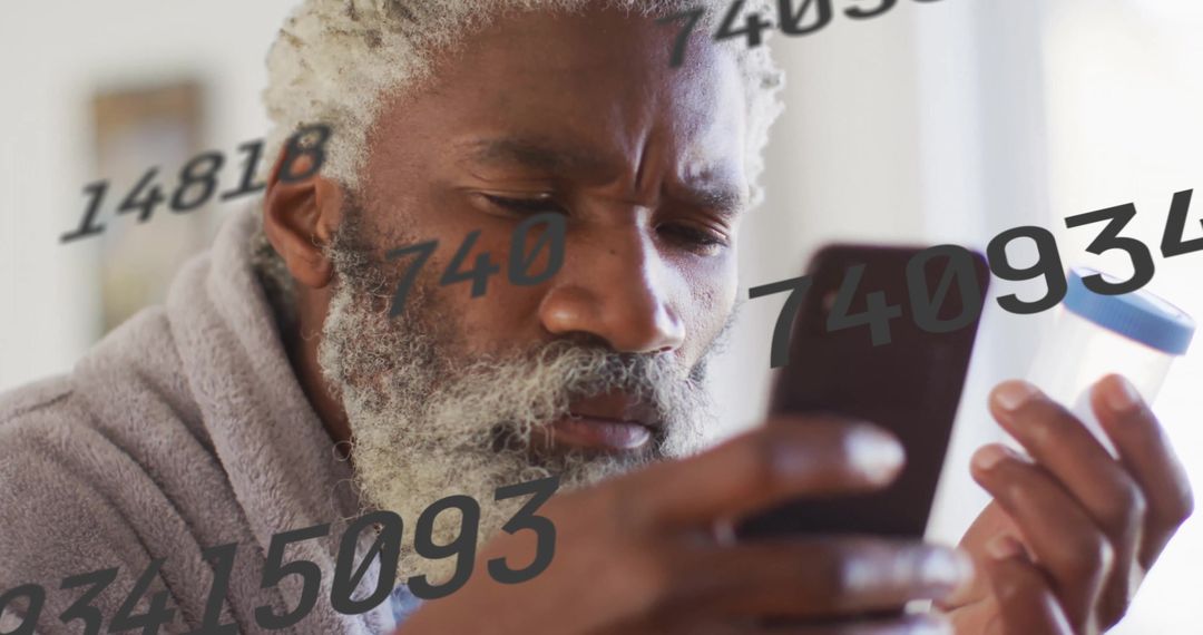 Senior Man Evaluating Smartphone Data at Home