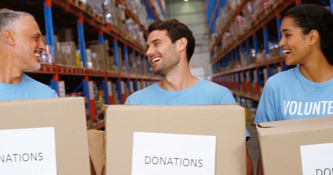 Volunteers Organizing Donations in Warehouse - Free Images, Stock Photos and Pictures on Pikwizard.com