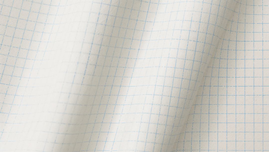 Folded Squared Graph Paper Texture Showing Blue Grid Lines and Subtle Creases