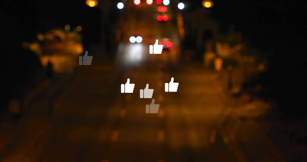 Floating thumbs-up lights night urban cityscape