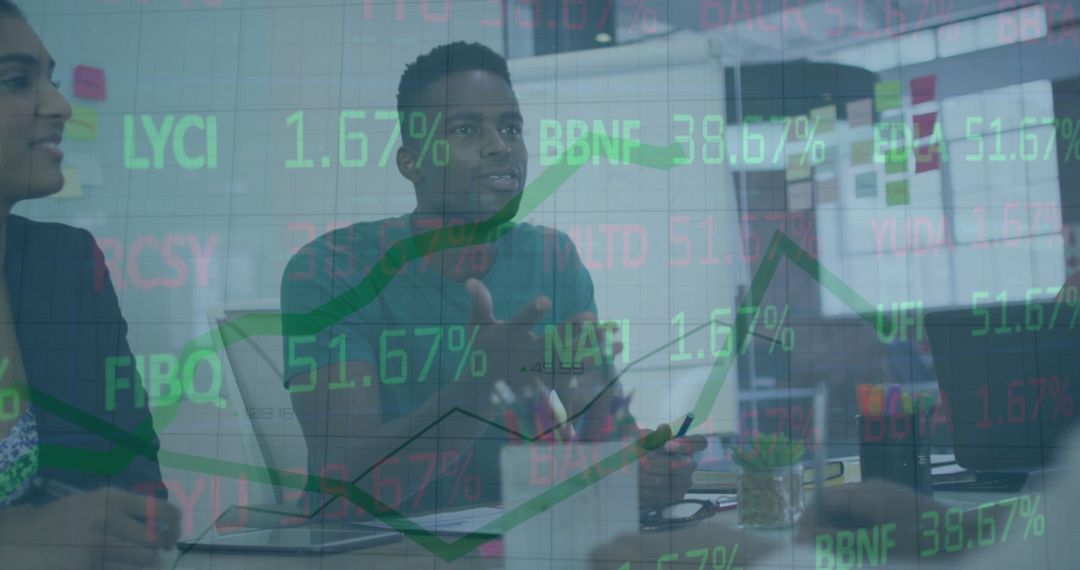 Diverse Business Team Discussing Financial Trends in Office