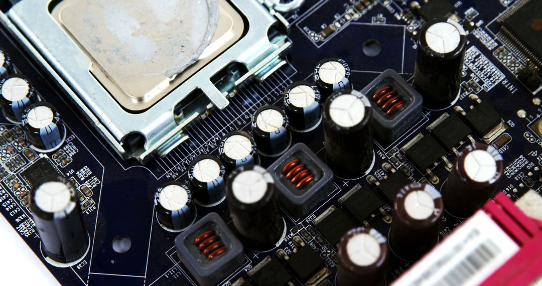 Close-Up of Motherboard with Capacitors and CPU Socket - Free Images, Stock Photos and Pictures on Pikwizard.com