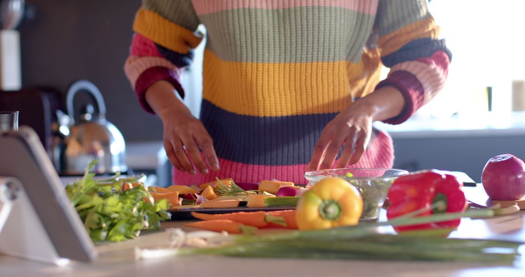 Person Cooking in Kitchen with Fresh Vegetables - Free Images, Stock Photos and Pictures on Pikwizard.com