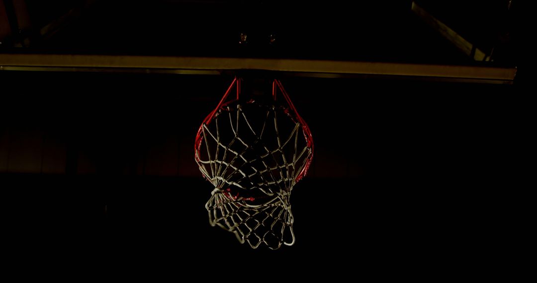 Basketball Hoop Close-Up in Darkness with Low Lighting - Free Images, Stock Photos and Pictures on Pikwizard.com