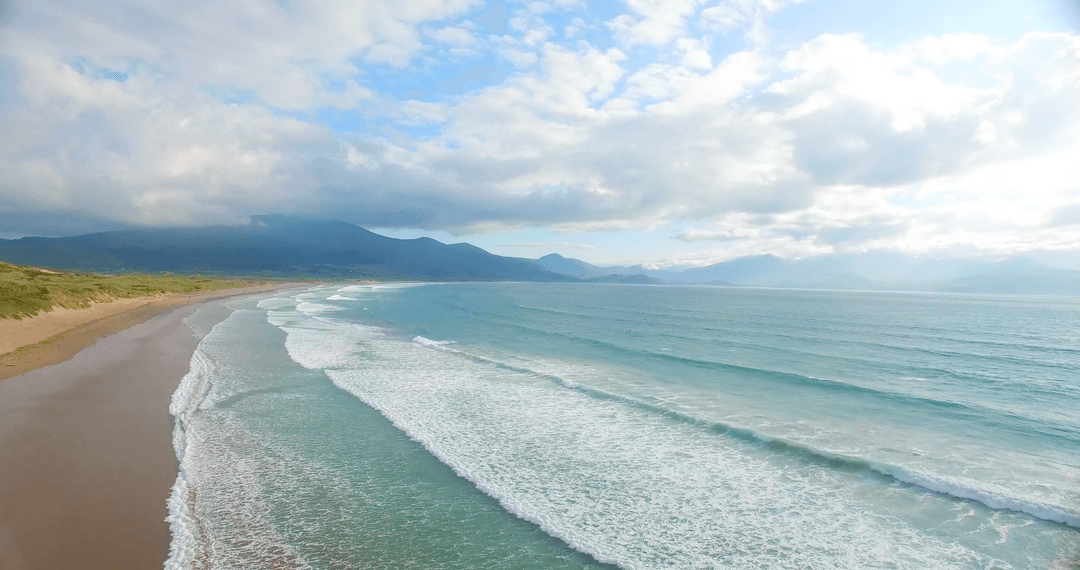 Panoramic Transparent Ocean Waves Rolling on Sandy Shore