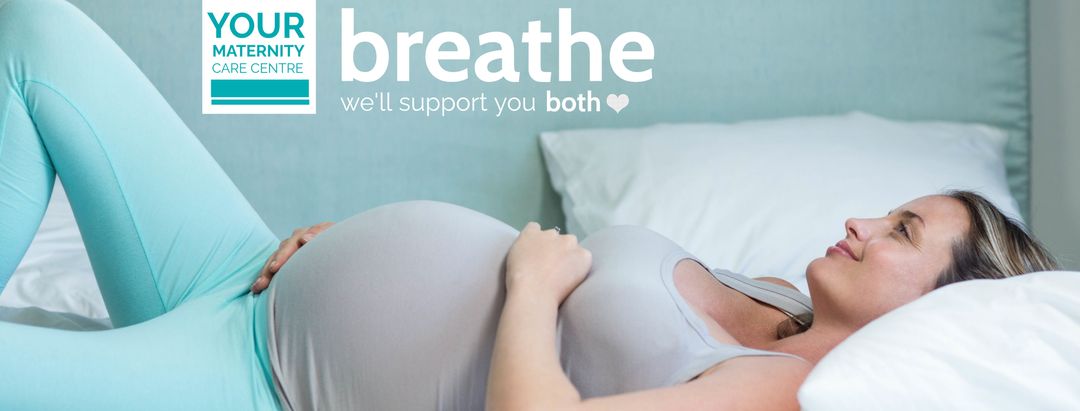 Pregnant Woman Practicing Breathing Exercises for Wellness