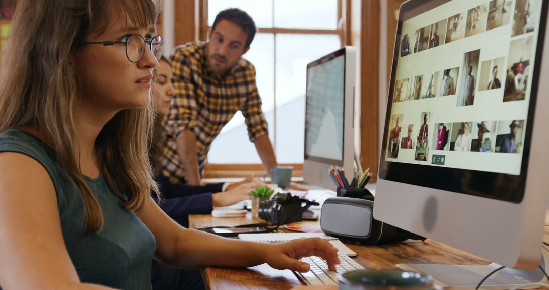 Creative Team Collaborating at Modern Office Workspace