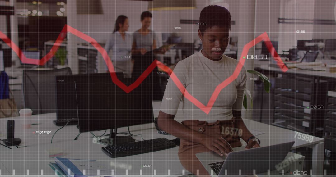 Businesswoman Analyzing Stock Market Data in Office with Graph Overlay - Free Images, Stock Photos and Pictures on Pikwizard.com