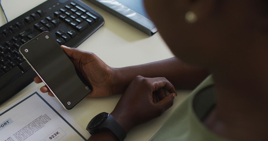 Businesswoman Holding Smartphone with Copy Space in Office