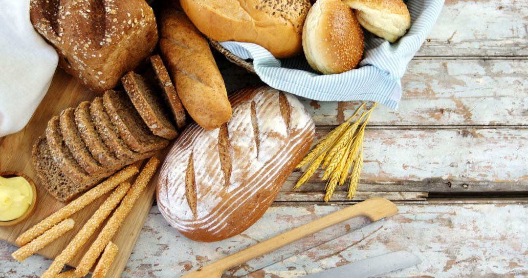 Assortment of Freshly Baked Bread on Rustic Wooden Table - Free Images, Stock Photos and Pictures on Pikwizard.com