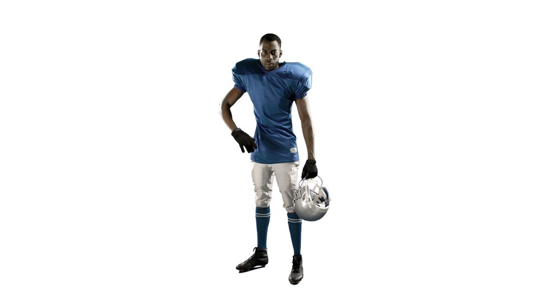 Football Player in Blue Jersey Holding Helmet - Free Images, Stock Photos and Pictures on Pikwizard.com